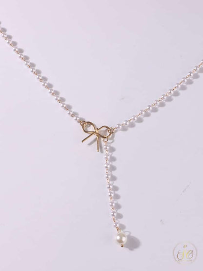 Modern Chic Bow Faux Pearl Tassel Necklace - SeoulChic.store