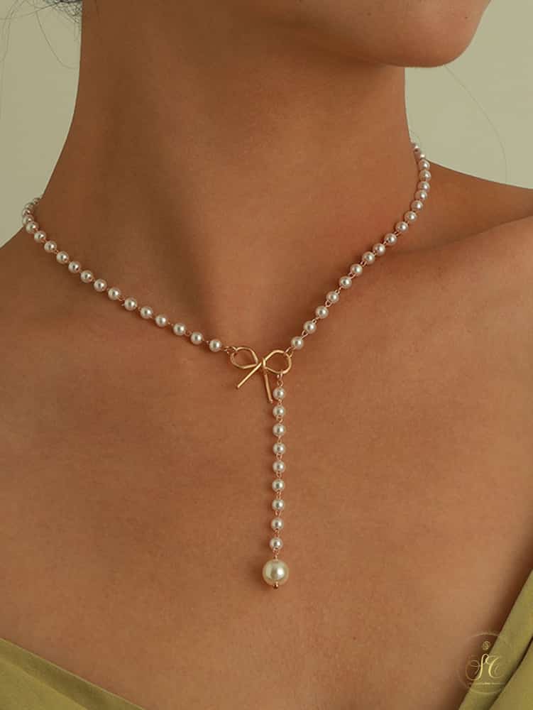 Modern Chic Bow Faux Pearl Tassel Necklace - SeoulChic.store
