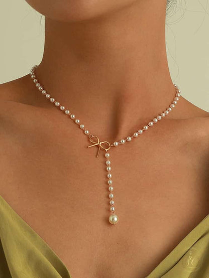 Modern Chic Bow Faux Pearl Tassel Necklace - SeoulChic.store
