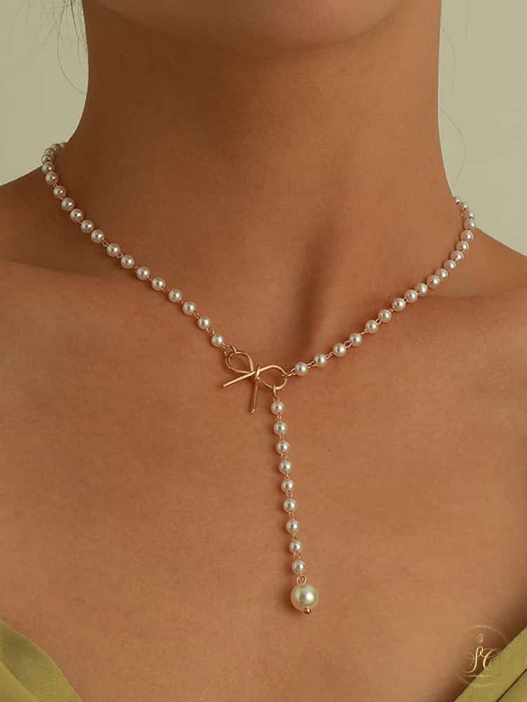 Modern Chic Bow Faux Pearl Tassel Necklace - SeoulChic.store