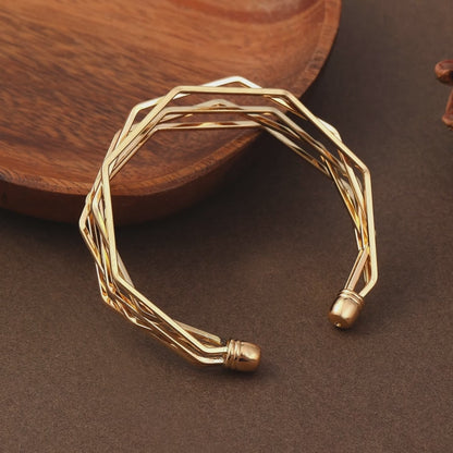 Signature A Polygon Shaped Silver Bangle